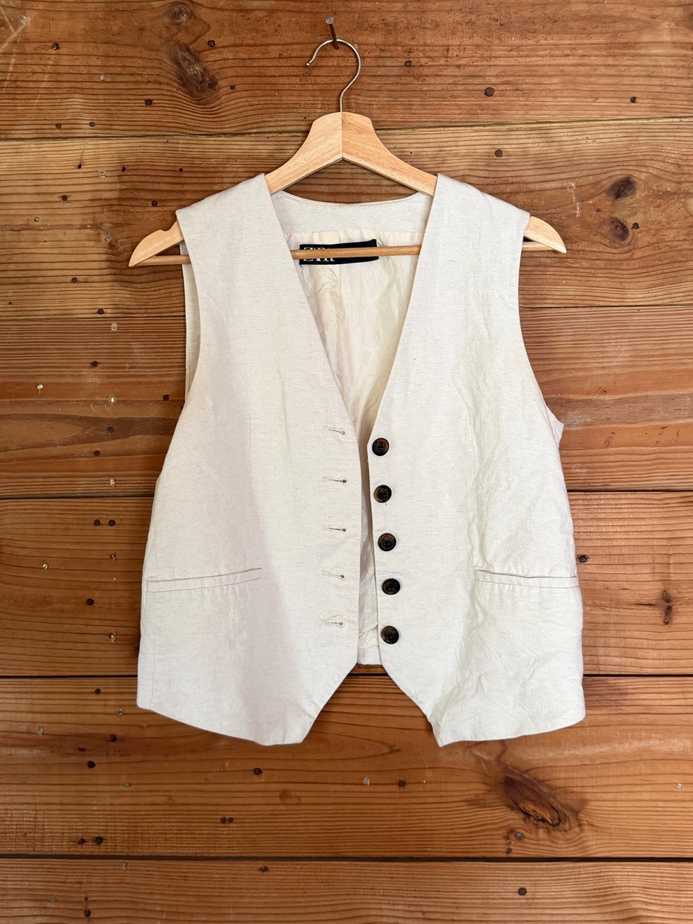 Creamy White vest with brown buttons